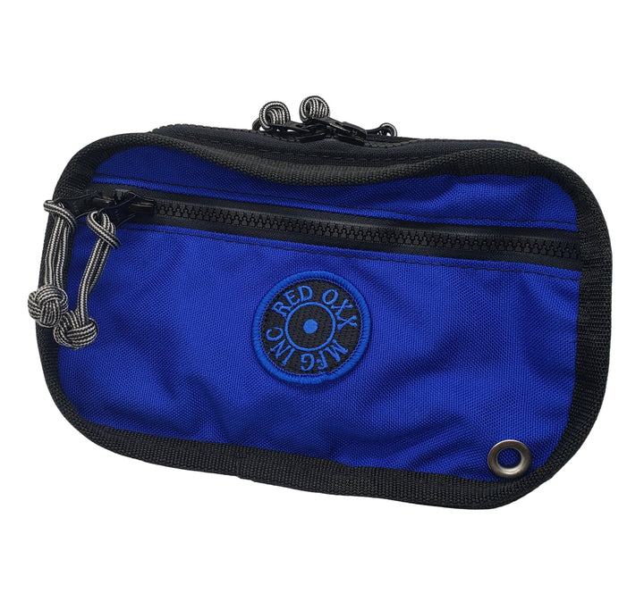 A blue USWR Extreme Dive Pouch with multiple zippered compartments and stainless steel d-rings, designed to be attached to a BCD.